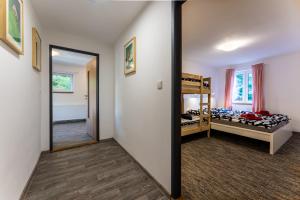 Postel nebo postele na pokoji v ubytování Apartmán Liška v Peci - apartmánový dům Horalka, Pec pod Sněžkou