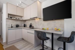 Kuchyň nebo kuchyňský kout v ubytování Apartments Penkala