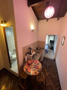 a room with a table with a coffee maker on it at Apartment Salta 2 pax in Salta