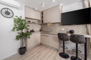 Kuchyň nebo kuchyňský kout v ubytování Apartments Penkala