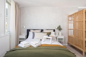 Postel nebo postele na pokoji v ubytování Apartments Penkala