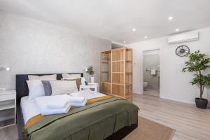 Postel nebo postele na pokoji v ubytování Apartments Penkala