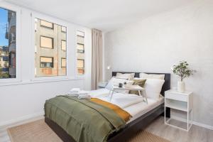 Postel nebo postele na pokoji v ubytování Apartments Penkala