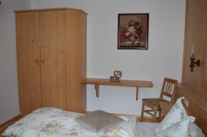 Postel nebo postele na pokoji v ubytování Haus Oblasser