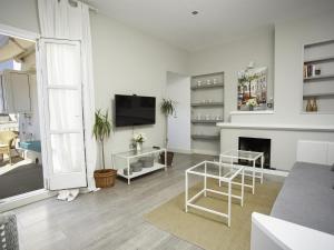 TV a/nebo společenská místnost v ubytování Sitges Spaces Bonaire Penthouse