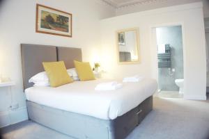 Postel nebo postele na pokoji v ubytování Barns Serviced Accommodation