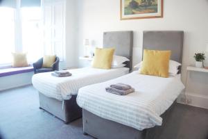 Postel nebo postele na pokoji v ubytování Barns Serviced Accommodation
