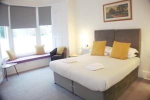 Postel nebo postele na pokoji v ubytování Barns Serviced Accommodation