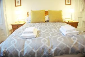Postel nebo postele na pokoji v ubytování Barns Serviced Accommodation