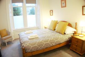 Postel nebo postele na pokoji v ubytování Barns Serviced Accommodation