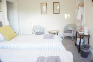 Postel nebo postele na pokoji v ubytování Barns Serviced Accommodation