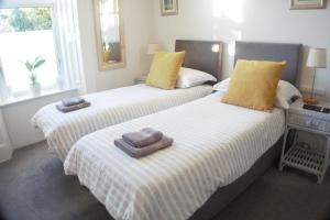 Postel nebo postele na pokoji v ubytování Barns Serviced Accommodation