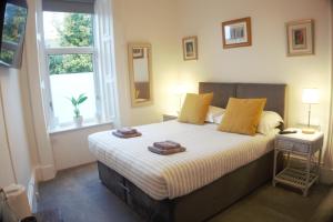 Postel nebo postele na pokoji v ubytování Barns Serviced Accommodation