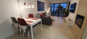 Posedenie v ubytovaní Triventi Apartament Rajski