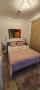 Posteľ alebo postele v izbe v ubytovaní Triventi Apartament Rajski