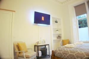 Postel nebo postele na pokoji v ubytování Barns Serviced Accommodation