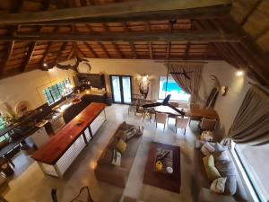 an overhead view of a living room and dining room at Honey Badger Safari House in Marloth Park