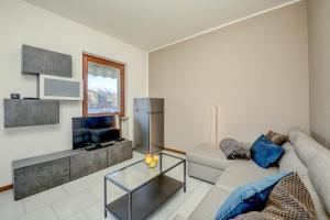 Μια τηλεόραση ή/και κέντρο ψυχαγωγίας στο My Garda Family Apartment Brenzone
