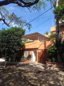 a house with a driveway in front of it at Casa D'mer Taganga in Taganga