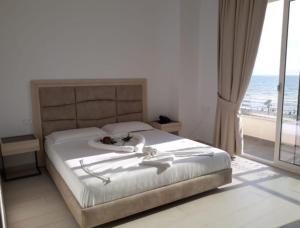 Postel nebo postele na pokoji v ubytování BluMare Resort