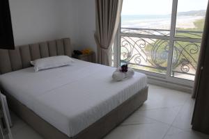 Postel nebo postele na pokoji v ubytování BluMare Resort