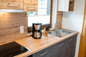 Kuchyň nebo kuchyňský kout v ubytování Wohn-Leben Altenmarkt Apartments