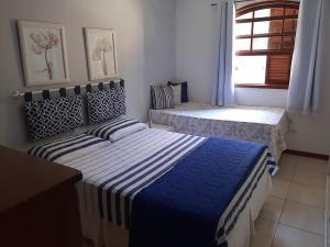 Postel nebo postele na pokoji v ubytování Casa de Campo Teresópolis + 29 fotografií