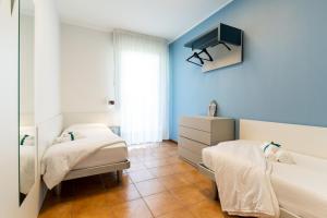 Кровать или кровати в номере Summer Time Family Resort