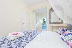 Posteľ alebo postele v izbe v ubytovaní Apart-rent Villa Ter 0010