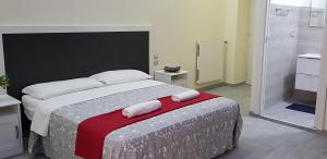 Postel nebo postele na pokoji v ubytování Lili & Aurora Home
