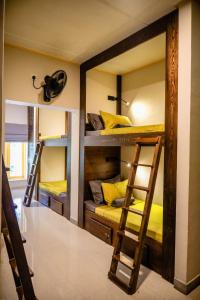 Letto o letti in una camera di Banana Bunks Kandy