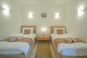 Ένα ή περισσότερα κρεβάτια σε δωμάτιο στο Casa Monte Cristo Apartments - Lemon +28 φωτογραφίες