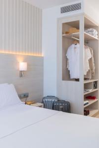 Een bed of bedden in een kamer bij Hotel Marsol