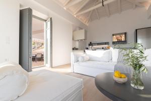 Ένα ή περισσότερα κρεβάτια σε δωμάτιο στο Villa Nupadi +31 φωτογραφίες