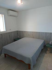 Résidence Les Pavillons du Belvédère客房内的一张或多张床位