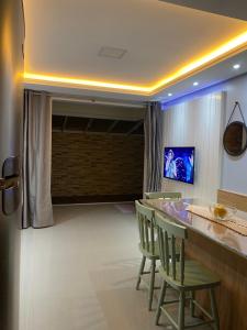 TV a/nebo společenská místnost v ubytování Residencial ilha d florence