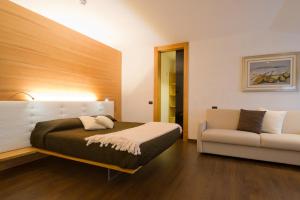Postel nebo postele na pokoji v ubytování Hotel Ferrovia