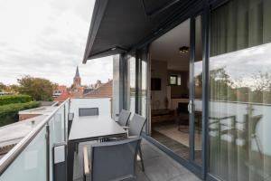 Balkón nebo terasa v ubytování Ooststraat 18a, Domburg