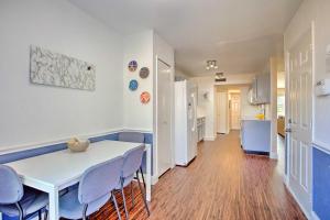 a kitchen and dining room with a table and chairs at Plano Home with Private Yard Less Than 5 Mi to Downtown! in Plano