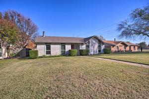 a house with a large yard in front of it at Plano Home with Private Yard Less Than 5 Mi to Downtown! in Plano
