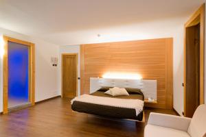 Postel nebo postele na pokoji v ubytování Hotel Ferrovia