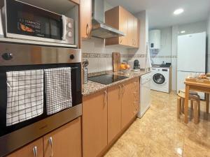 Kuchyň nebo kuchyňský kout v ubytování Amplio apartamento en pleno corazón de Alicante