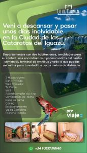 a flyer with a red bird flying over a building at Lo de Carmen Apart in Puerto Iguazú