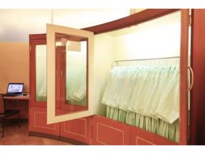 a mirror and a window in a room with a desk at R&B HOTEL MORIOKA EKIMAE - Vacation STAY 38798v in Morioka