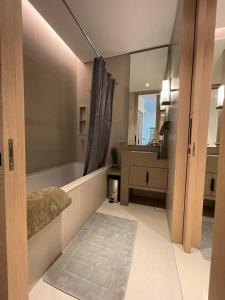 Letto o letti in una camera di ADDRESS BEACH Residence