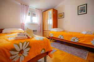 Posteľ alebo postele v izbe v ubytovaní Villa Brucker