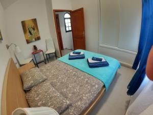 Łóżko lub łóżka w pokoju w obiekcie HATO Holiday Home Fuerteventura