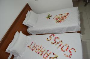 Postel nebo postele na pokoji v ubytování Hôtel Zahrat Souss -Inezgane