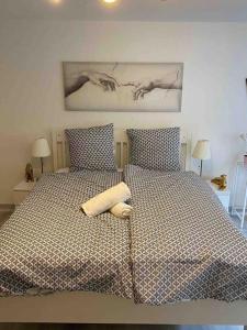 Postel nebo postele na pokoji v ubytování Private Studio Apartment in Bremgarten