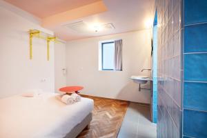 Koupelna v ubytování Hotel Not Hotel Rotterdam + 37 fotografií